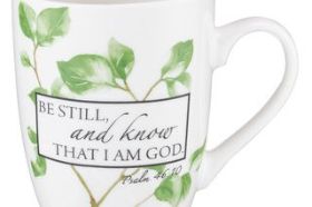 The Be Still Ceramic Coffee Mug illustrates the power of the God we fear. He is our refuge and our strength and our help in trouble. Start your day with a cup of coffee and meditate on the majesty of our God. The white ceramic Be Still Ceramic Coffee Mug features Scripture from the Psalms Be still, and know that I am God Psalm 46:10 A black framed square that holds the black printed sentiment is superimposed over a delicate green leaf pattern. The ceramic coffee mug holds 12 fluid ounces and is the perfect height for personal use coffee brewing systems. The mug arrives in a packaged gift box, making this a cherished gift for any occasion. Support a loved one with the encouraging words printed on this mug or keep one for yourself. The Be Still Ceramic Coffee Mug will remind you not to live in fear because you serve an awesome God. Capacity: 12 fl oz (360ml) Ceramic Mug Microwave Safe Tested for Lead Packaged in a Gift Box