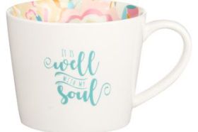 It is well with my soul mug. Sip your coffee or tea from the Well With My Soul Ceramic Mug and delight in the comfort and inner peace assured by the words of the much-loved hymn. Designed with delightful abstract florals swirling inside the white ceramic mug in shades of pink, coral, tangerine, burnt orange, pale blue, and fuchsia. The outside delivers the affirming message, “It is well with my soul,” in cheerful teal lettering. Tuck this 13 fluid ounce ceramic mug within the coordinating gift bag from the Well With My Soul Collection for a coordinated and ready-to-gift duo, perfect for any occasion, including just because! Ceramic Mug Packaged in a Gift Box Not Microwave or Dishwasher Safe Tested for Lead Capacity: 13 Fl Oz (384 ml)