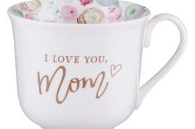 For Mother's Day, her birthday, or any time you want to honor Mom, our Love You Mom Ceramic Mug will serve as a perpetual reminder of your love and appreciation for everything your mother does for you. The exterior of the mug delivers a simple message in metallic gold foil script I love you, Mom The opposite side reads: Proverbs 31:29 This Scripture reference explains that while other women do noble things, your mother surpasses them all. She will never grow tired of that sentiment! The decaled floral interior, flared rim, and graceful curve of the handle give this ceramic mug a particularly feminine feel. With every sip, the floral inner surface in hues of muted pinks and blues will bring Mom the joy of a field of fresh flowers throughout all the seasons. At 14 fl oz capacity, the Love You Mom Ceramic Coffee Mug will hold her favorite beverages on Mother's Day, a special day, or any day. This beautifully feminine mug is part of the I Love You Mom Collection, where you will find a selection of coordinating gifts designed to express your love and gratitude towards your mother. The collection includes a teapot, glass water bottle, a tea for one teapot set, a magnetic notepad, and a pre-packed gift set that consists of a glass water bottle paired with a notepad. Any gift from this selection is sure to please your mother. I Love You Mom Collection Ceramic Mug Metallic Gold Foil Lettering Not Microwave Safe Due to Foil Not Dishwasher Safe Due to Foil Packaged in Gift Box Capacity: 14 fl oz (414 ml) Gift Box Dimensions: 4.1" x 4.7" x 4.1" (104 x 119 x 104 mm)